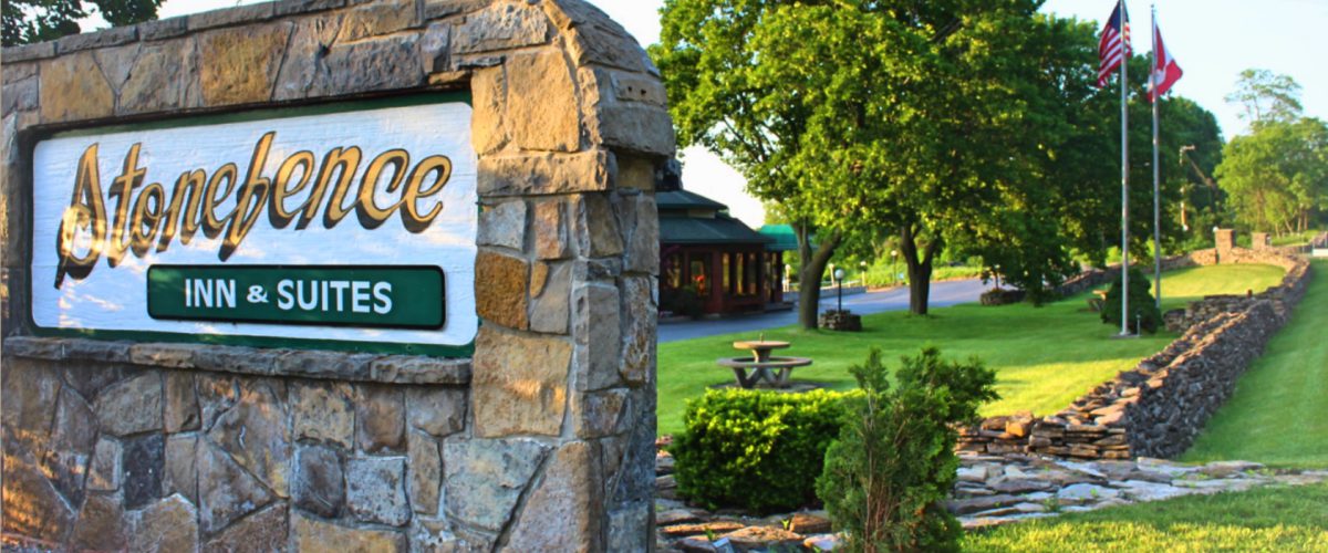 Stone Fence Resort Inn & Suite sign